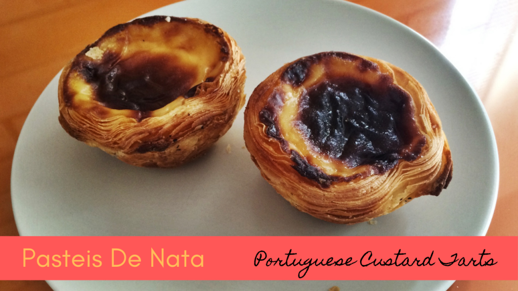 Portuguese egg custard tart pastry dusted with cinnamon.